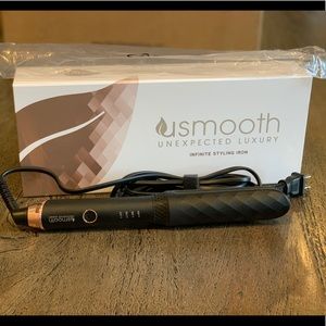 Usmooth infinite styling iron. Used once!
